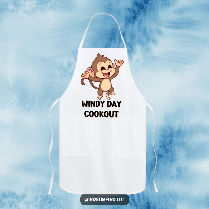 Funny apron shows a mischievous monkey leaning playfully into a strong gust of wind, perfect for playful chefs.