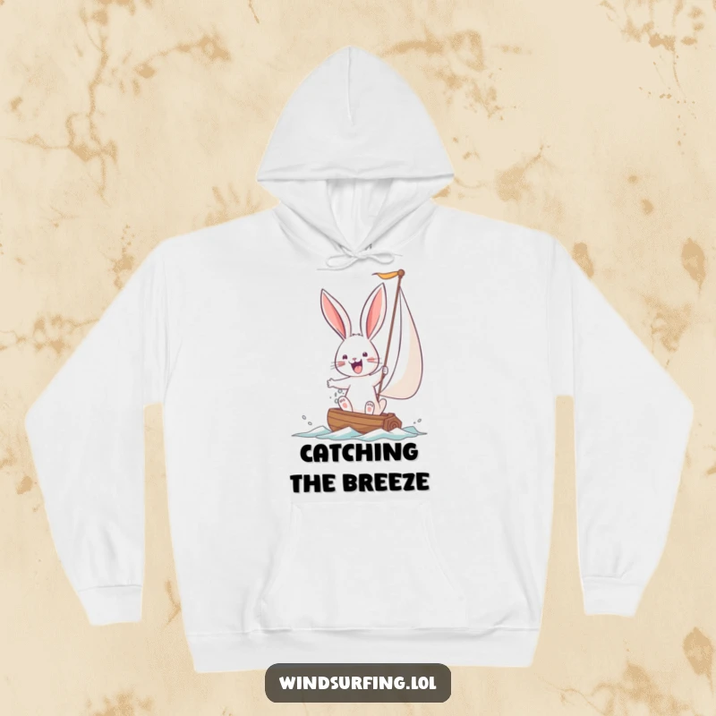Funny Bunny Hoodie showing a joyful bunny wrestling with a large sail. Cozy, warm, and full of motivational humor.