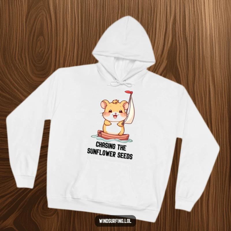 Funny Hoodie: A smiling hamster gracefully propels itself with a miniature sail, radiating joy and self-sufficiency.