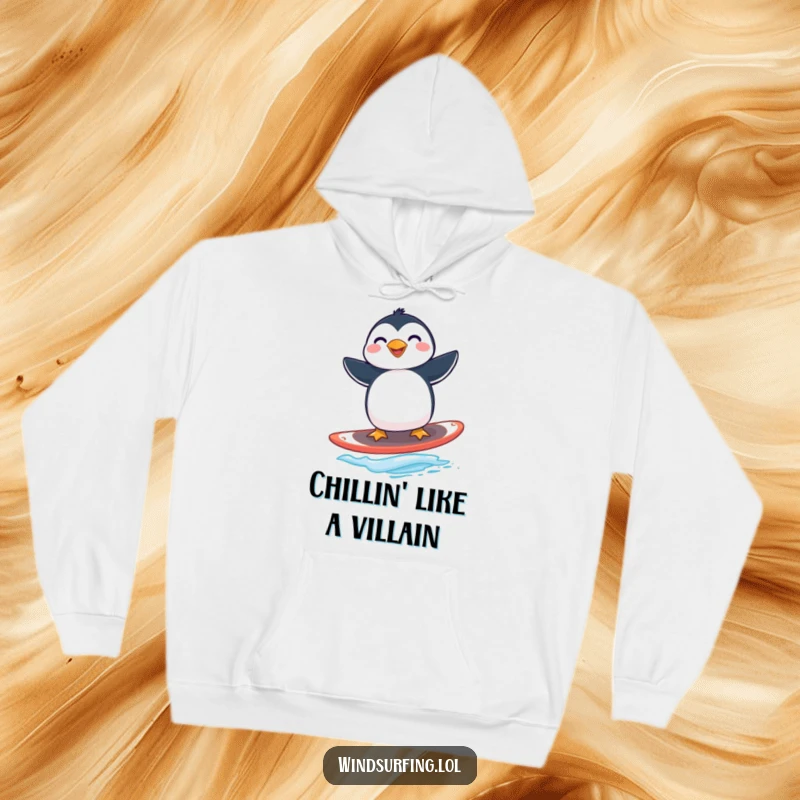 Funny penguin windsurfing hoodie showing a joyful penguin balancing precariously on a windsurfing board.