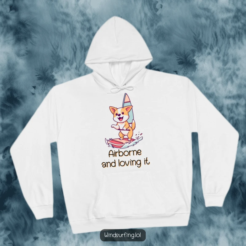Funny Hoodie: A happy dog catching air while windsurfing, radiating pure joy and a sense of freedom.