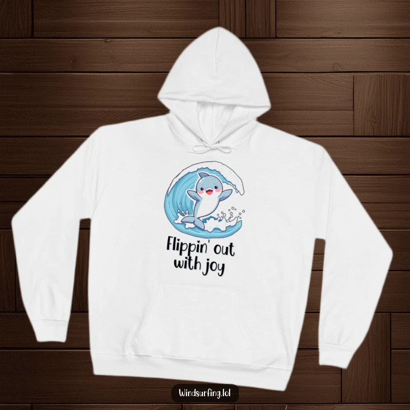 Funny hoodie featuring a playful dolphin joyfully catching a wave with arms outstretched, perfect for staying warm and radiating happiness.