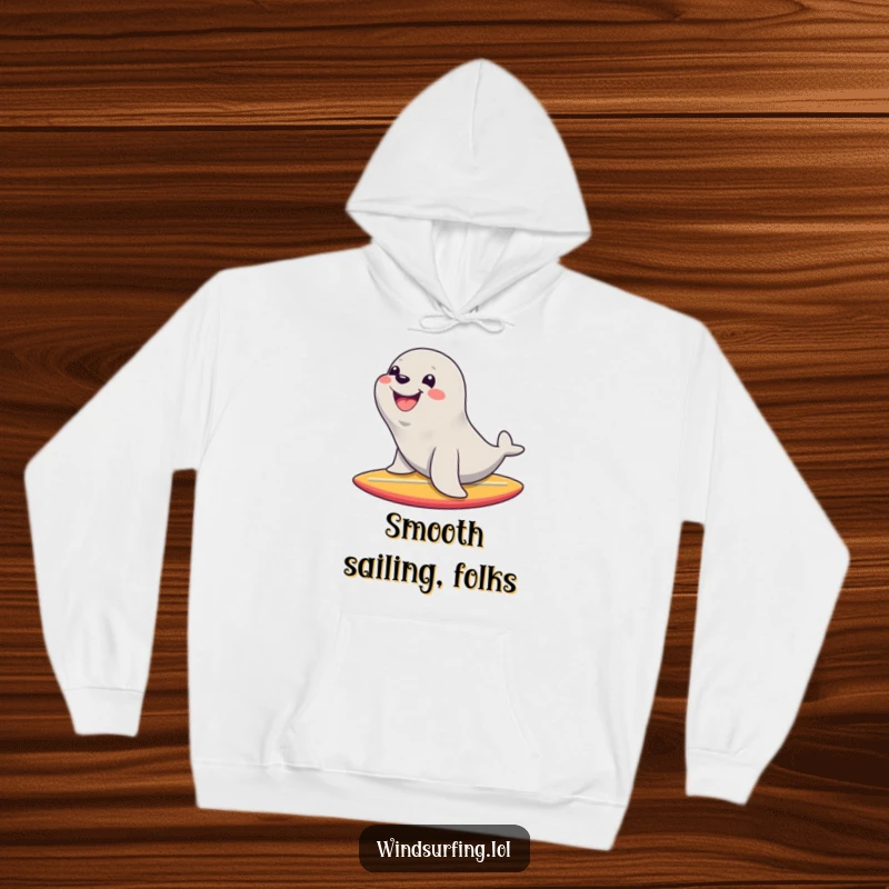 Funny hoodie featuring a happy seal with a massive smile riding a surfboard, perfect for staying warm and radiating joy.