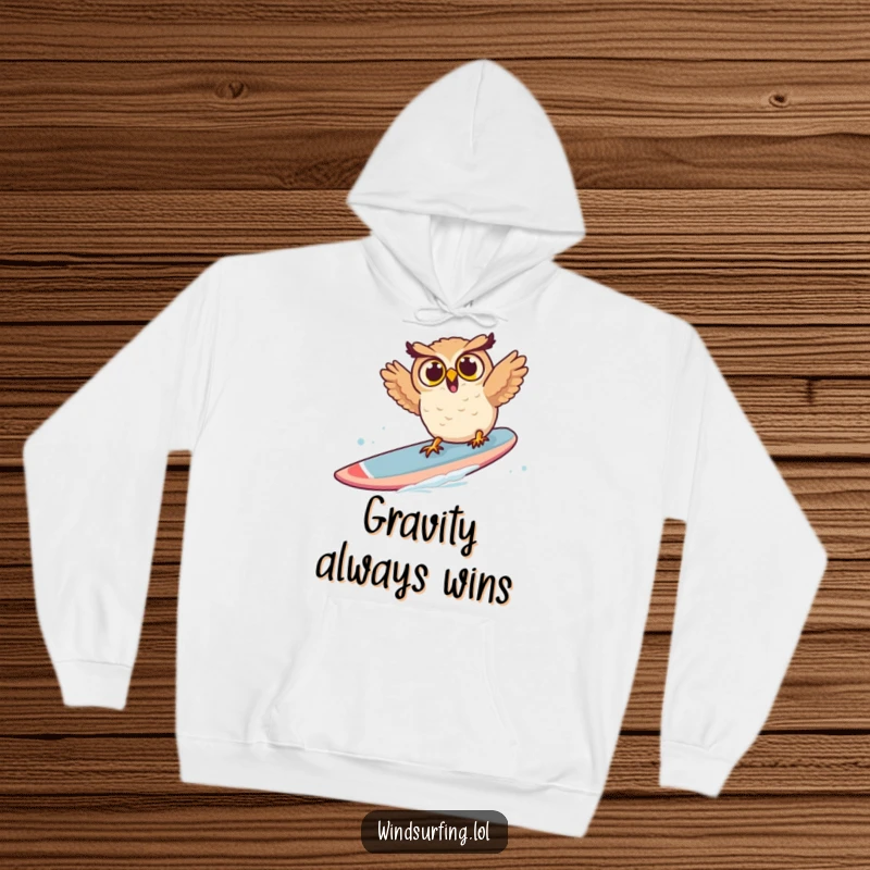 Funny owl hoodie showing a surprised owl flailing as it falls off a windsurf board, embodying comical mishap.
