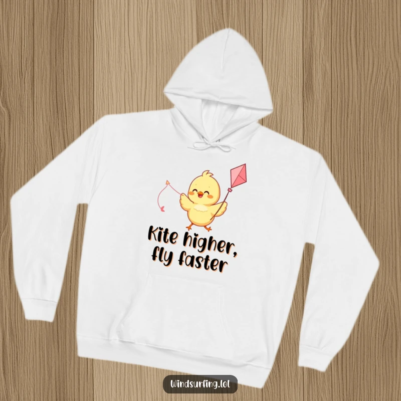 Funny hoodie depicting a delighted chick using a kite as a sail, ready for cozy, fun-filled adventures.