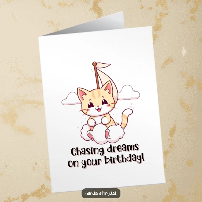 Funny Free Printable Birthday Card: Smiling cat sailing with a cloud as a sail, catching sweet birthday dreams with a happy expression.