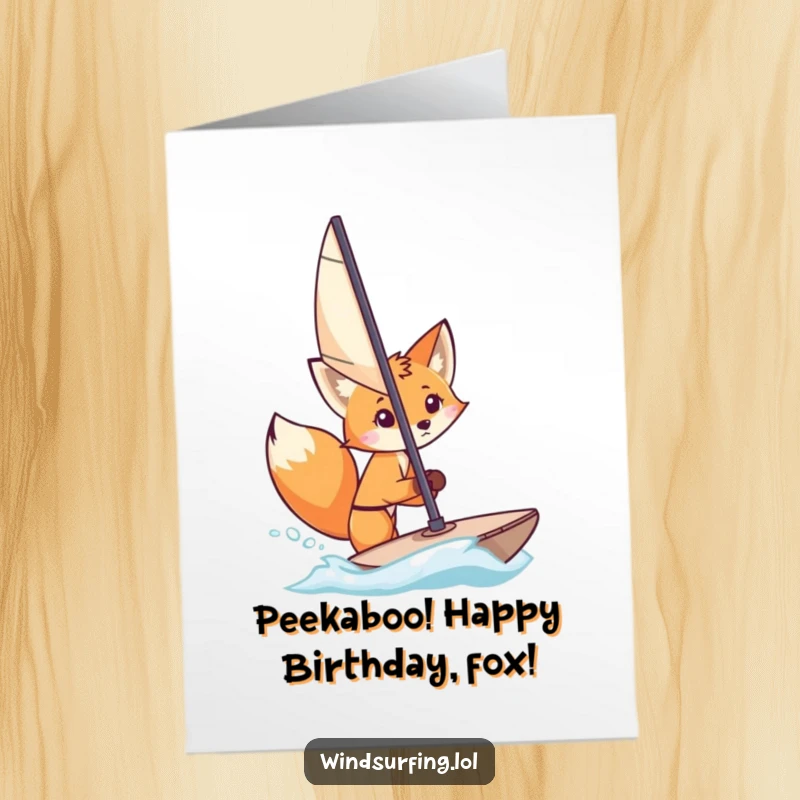 Funny Free Printable Birthday Card: A curious fox playfully peeks from behind a windsurfing sail, adding a whimsical birthday surprise.