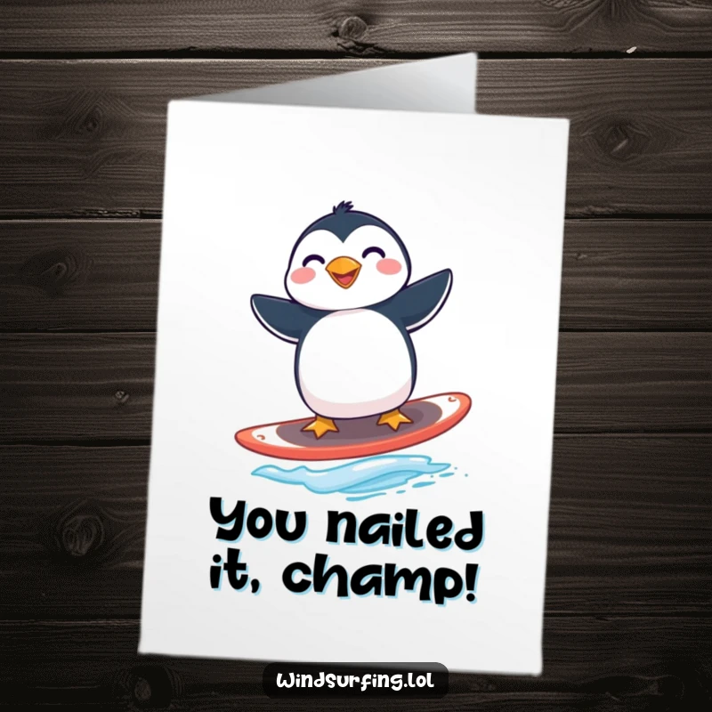 Funny Free Printable Congratulations Card: Expert penguin windsurfer celebrating a big achievement with a huge grin.