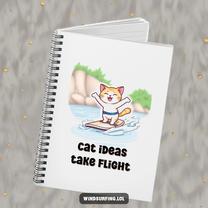 Funny notebook with a joyful cat windsurfing, perfect for jotting down notes with feline flair and humor.