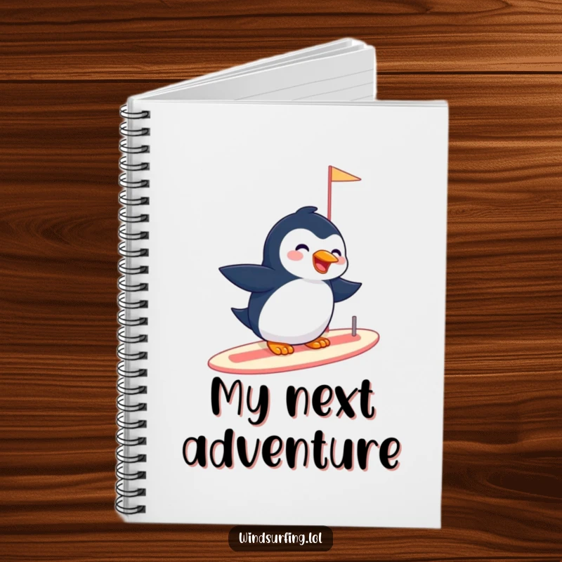 Funny notebook with a giggling penguin effortlessly gliding on a sailboard, inspiring creative writing and playful arctic adventures.