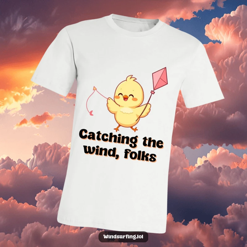 Funny t-shirt featuring a delighted chick joyfully using a kite as a sail, embracing the wind with glee.