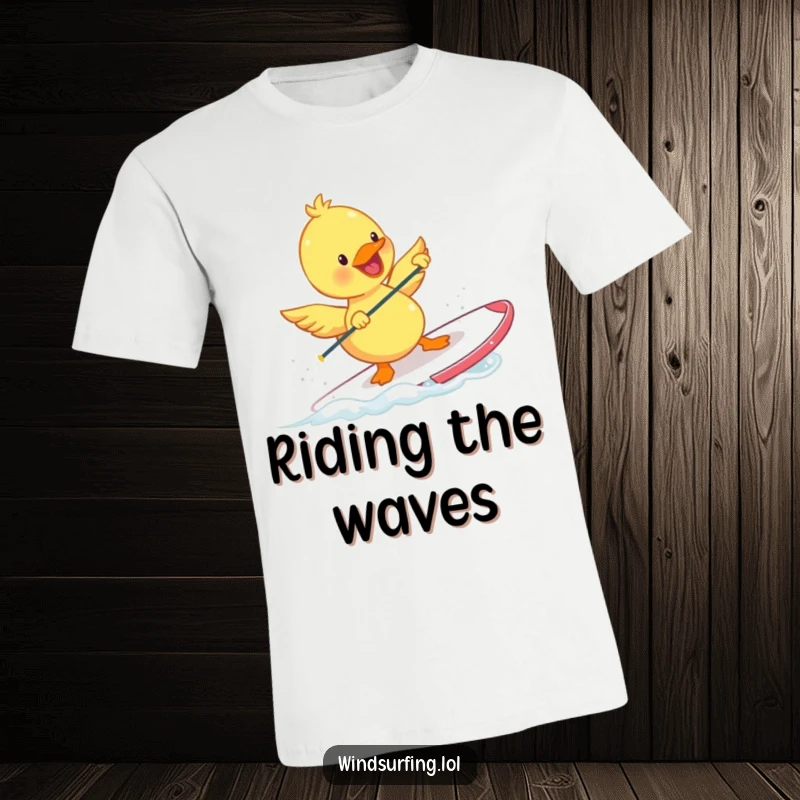 Funny Duckling T-Shirt depicting a happy duckling windsurfing with tiny, flapping wings. A comical and vibrant graphic tee for fun.