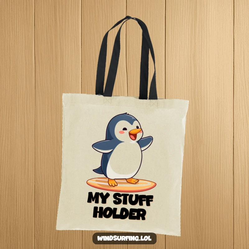 Funny Penguin Surfing Tote Bag: A joyful penguin glides on a surfboard, arms wide, carrying adventures with humor.